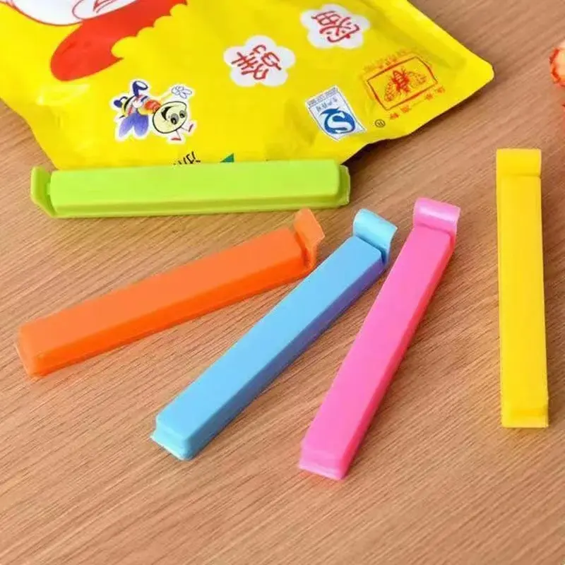 kf-S7c02587469974030a9ceade6e820afb3C 10Pcs Portable New Kitchen Storage Food Snack Seal Sealing Bag Clips Sealer Clamp Plastic Tool Kitchen Accessories - Image 1