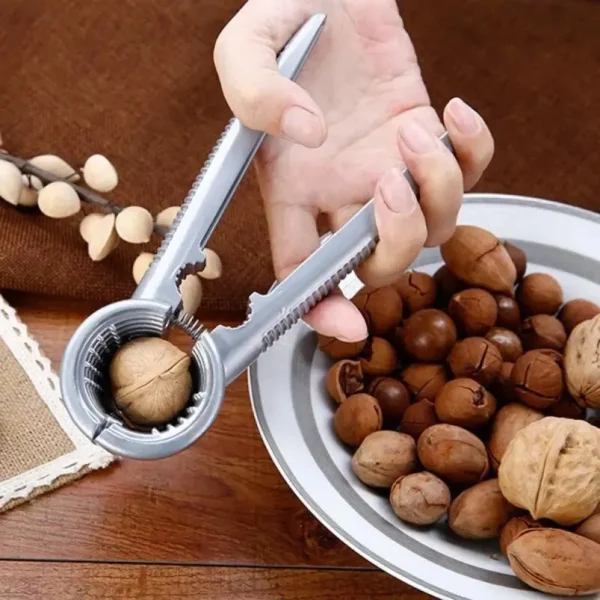 kf-S97fd7ae00c0f4ceab59de5a9ec61cc34j 1pc Silvery Metal Multi Functional Walnut Clip Household Nut Shelling Tools Suitable for Walnuts Chestnuts and Hazelnut - Image 1