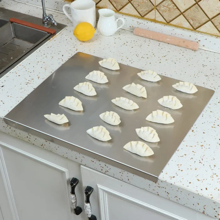 kf-Sa6e736ce9e3e44059a80cba3573f0cfdQ Stainless Steel Cutting Board With Lip Countertop Protector Multifunction Pastry Baking Board Fruit Meat Chopping Board - Image 6