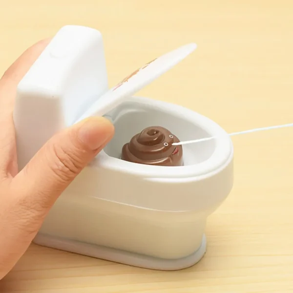 kf-Scd7db5f932634d918cab75e267a293afb 1PC-Novel Interesting Poop Spray Prank Toy Joke Cary Toys Mini Sprinkler Toilet Spray Gun Simulation Toilet Toy - Image 1
