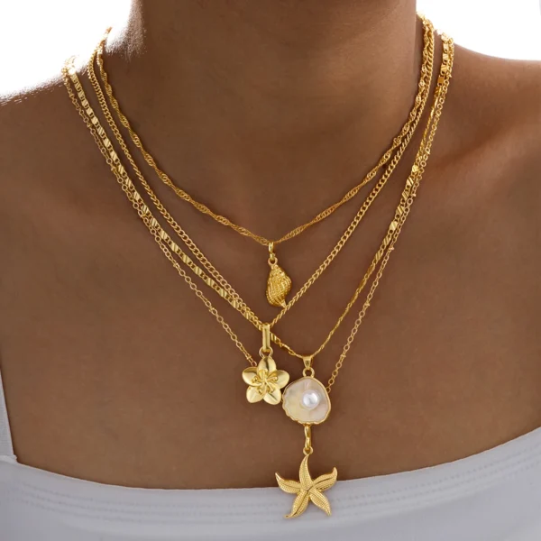 4Pcs/Set Shiny Shell Starfish Conch Flower Necklaces for Women Simple Imitation Pearl Gold Color Pendant Necklace Female Jewelry - Image 1