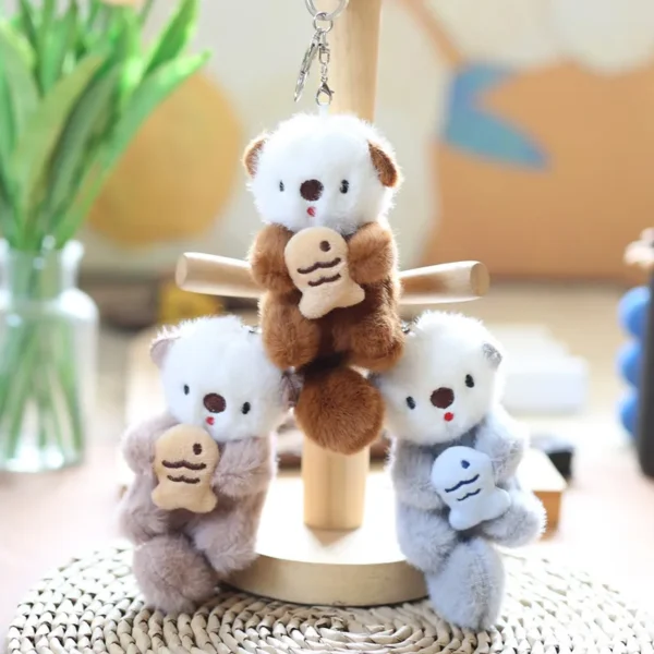 ZAKOL Cute Otters Holding Fish Plush Pendant Keychain Backpack Keyrings Pendant Bag Key Wallet Pendant Wholesale - Image 1